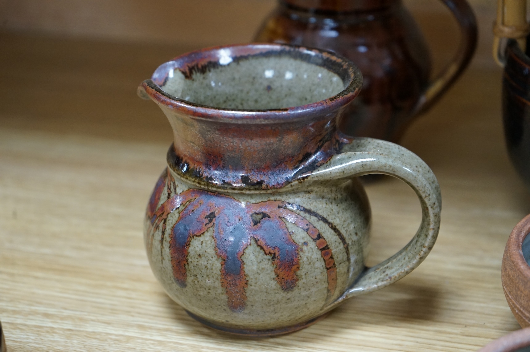 A large group of 20th century signed and unsigned Studio pottery, tallest 23cm high